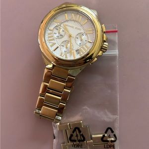Gold MK watch